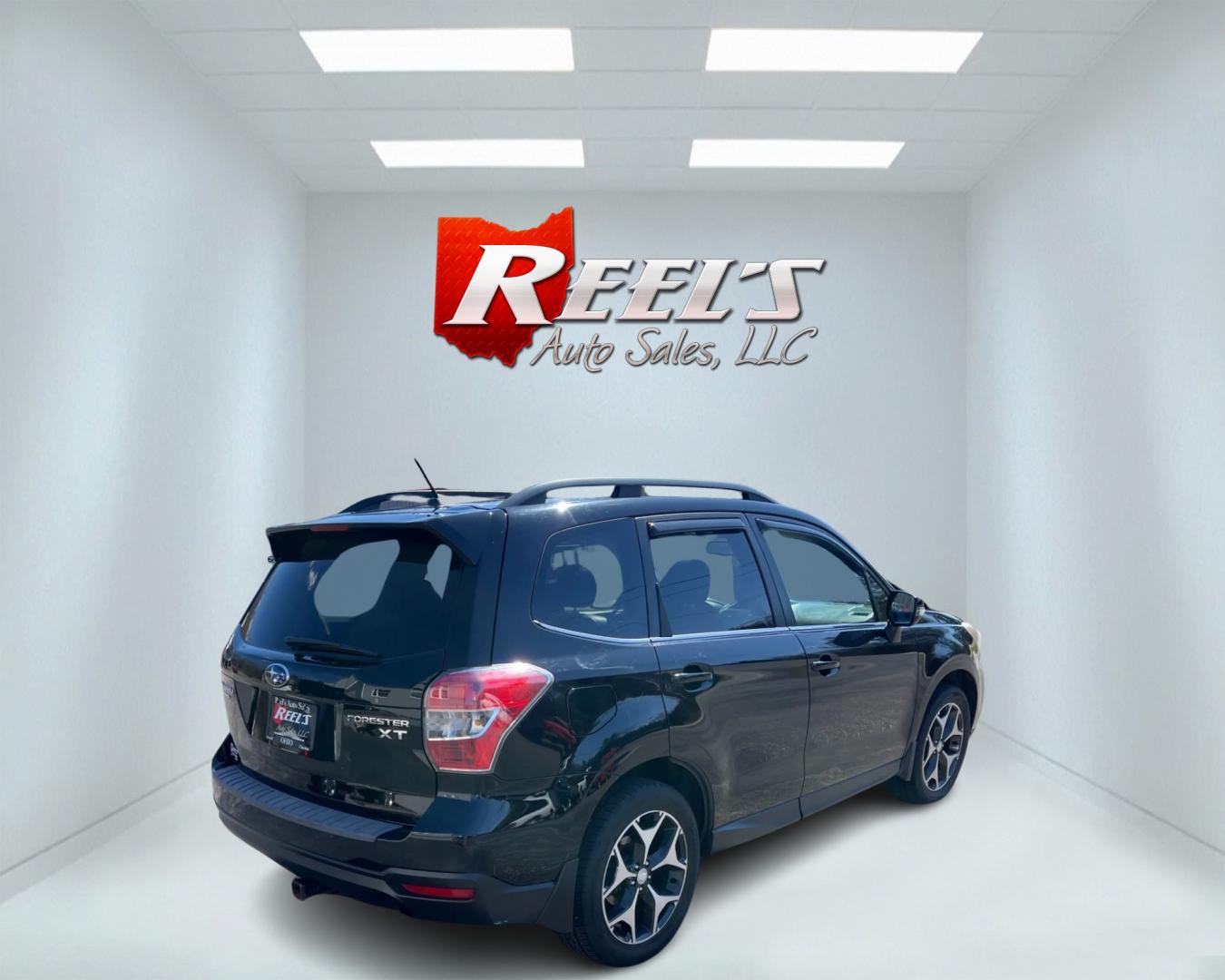 2014 Black /Black Subaru Forester 2.0XT Touring (JF2SJGMC4EH) with an 2.0L H4 SOHC 16V TURBO engine, Automatic transmission, located at 547 E. Main St., Orwell, OH, 44076, (440) 437-5893, 41.535435, -80.847855 - Photo#5